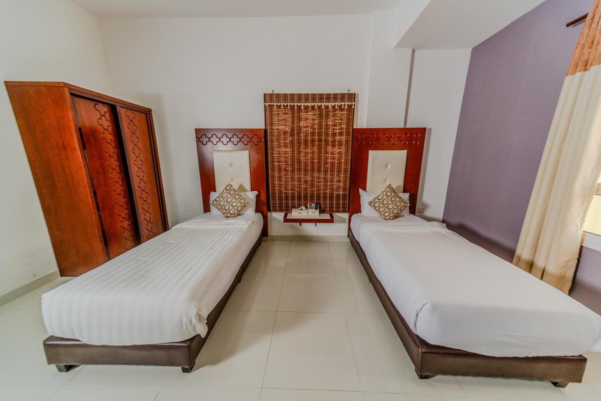 Zaki Hotel Apartment Sur Luaran gambar