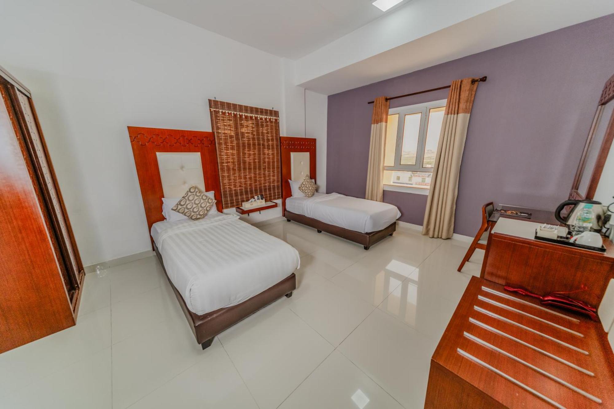 Zaki Hotel Apartment Sur Luaran gambar