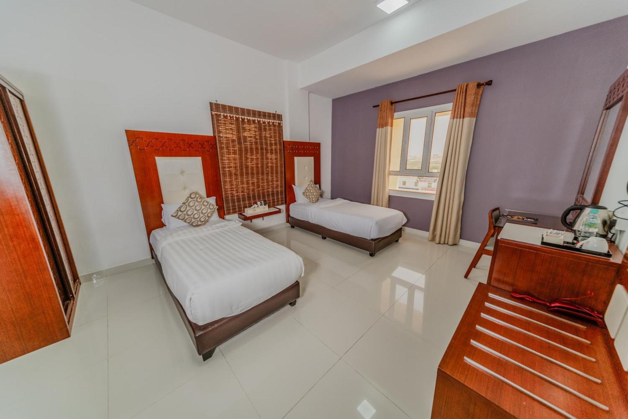 Zaki Hotel Apartment Sur Luaran gambar